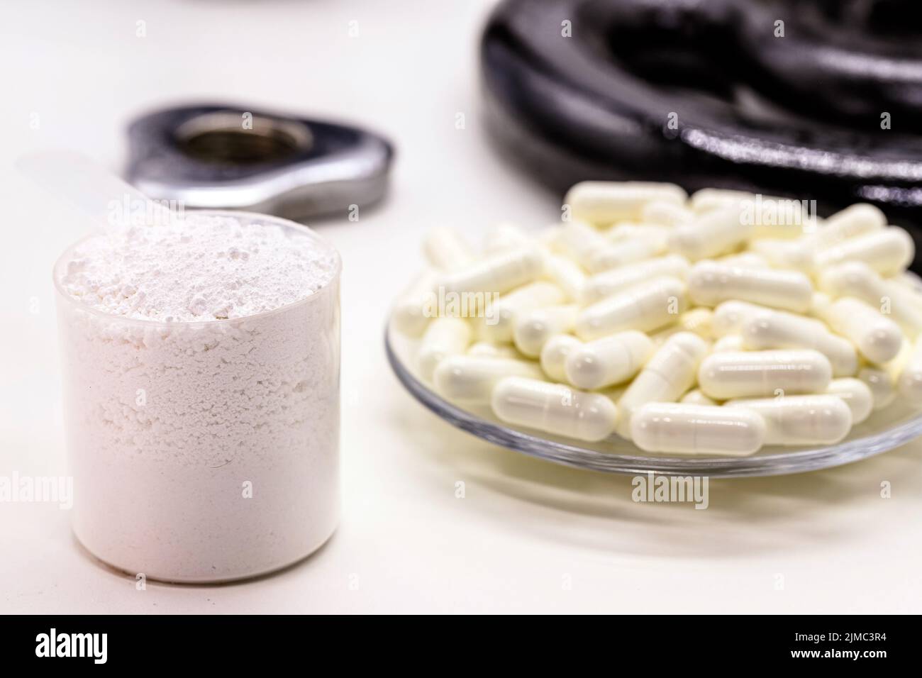 creatine pills, food supplement or energy vitamin for physical activity. Medicine to lose weight used in bodybuilding Stock Photo