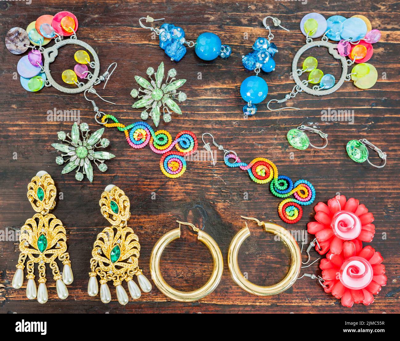 Costume jewelry for women. Various types of earrings. Stock Photo