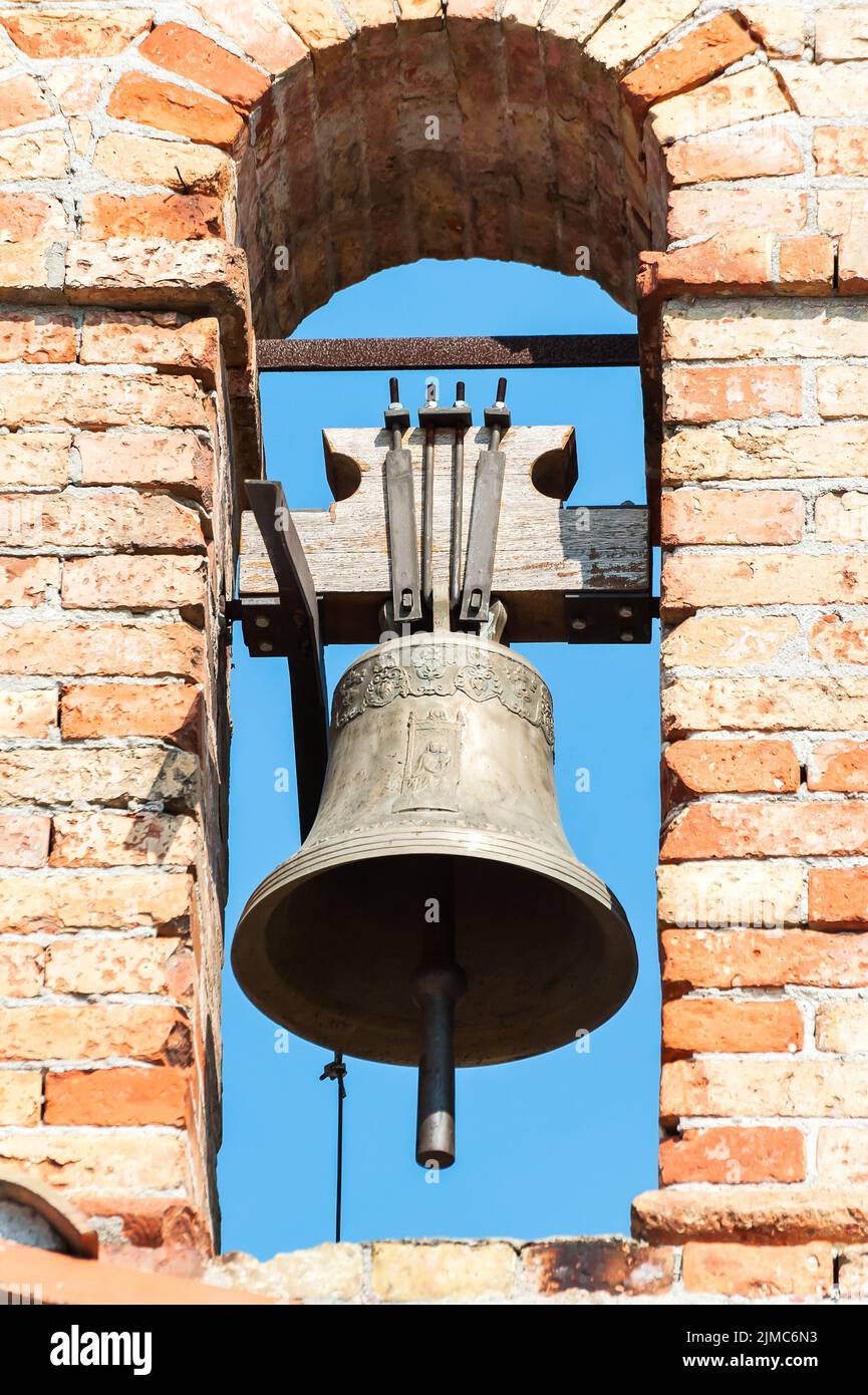 Small bell tower with a bell Stock Photo