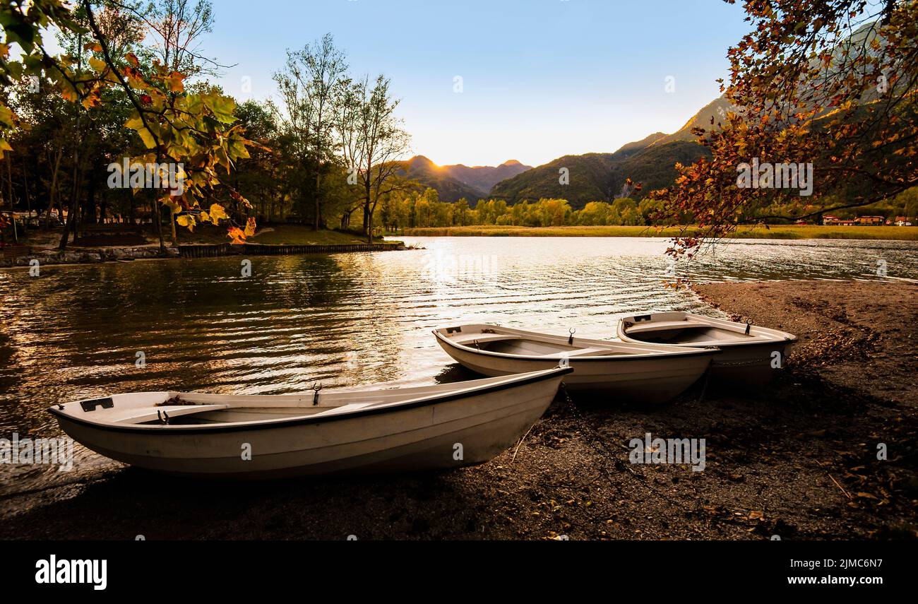 Waterfront three fishing boats hi-res stock photography and images - Alamy