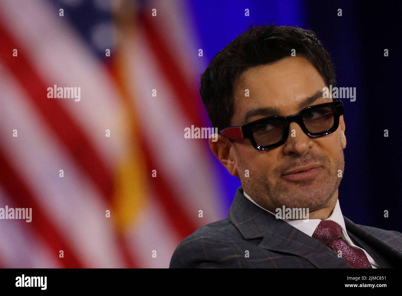 Brandon Straka, who was convicted on charges linked the January 6 attacks on the U.S. Capitol, speaks at the Conservative Political Action Conference (CPAC) in Dallas, Texas, U.S., August 5, 2022.  REUTERS/Brian Snyder Stock Photo