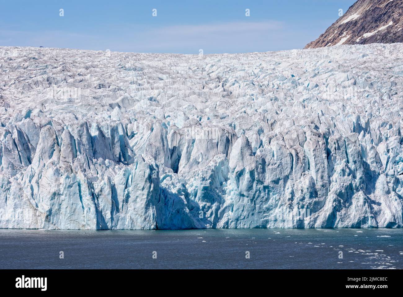 Close up of the huge face of a craggy glacier in Prince Christian Sound, South Greenland Stock Photo