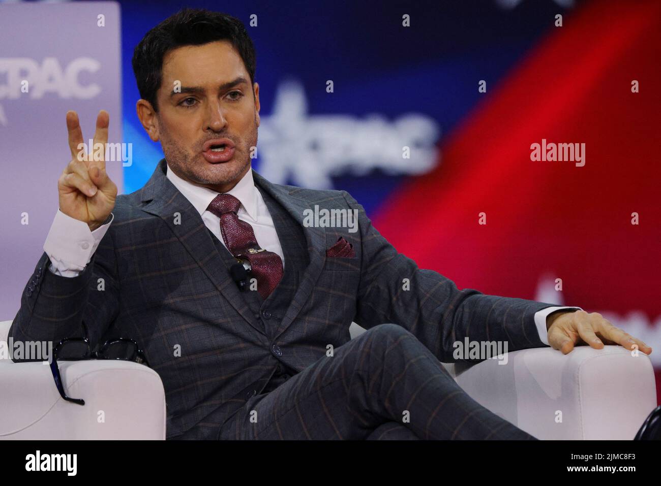 Brandon Straka, who founded #WalkAway and was convicted on charges linked to the January 6 attacks on the U.S. Capitol, speaks at the Conservative Political Action Conference (CPAC) in Dallas, Texas, U.S., August 5, 2022.  REUTERS/Brian Snyder Stock Photo