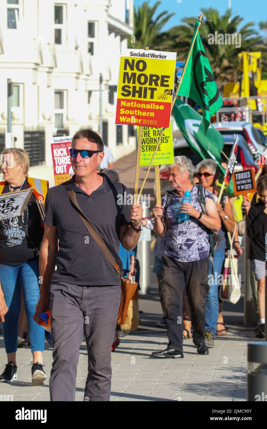 Eastbourne. East Sussex, UK. 5th Aug, 2022. Protesters marched through Eastbourne today as the town hosts the latest Hustings for the Tory Party Leadership contest. Credit: Pete Abel/Alamy Live News Stock Photo