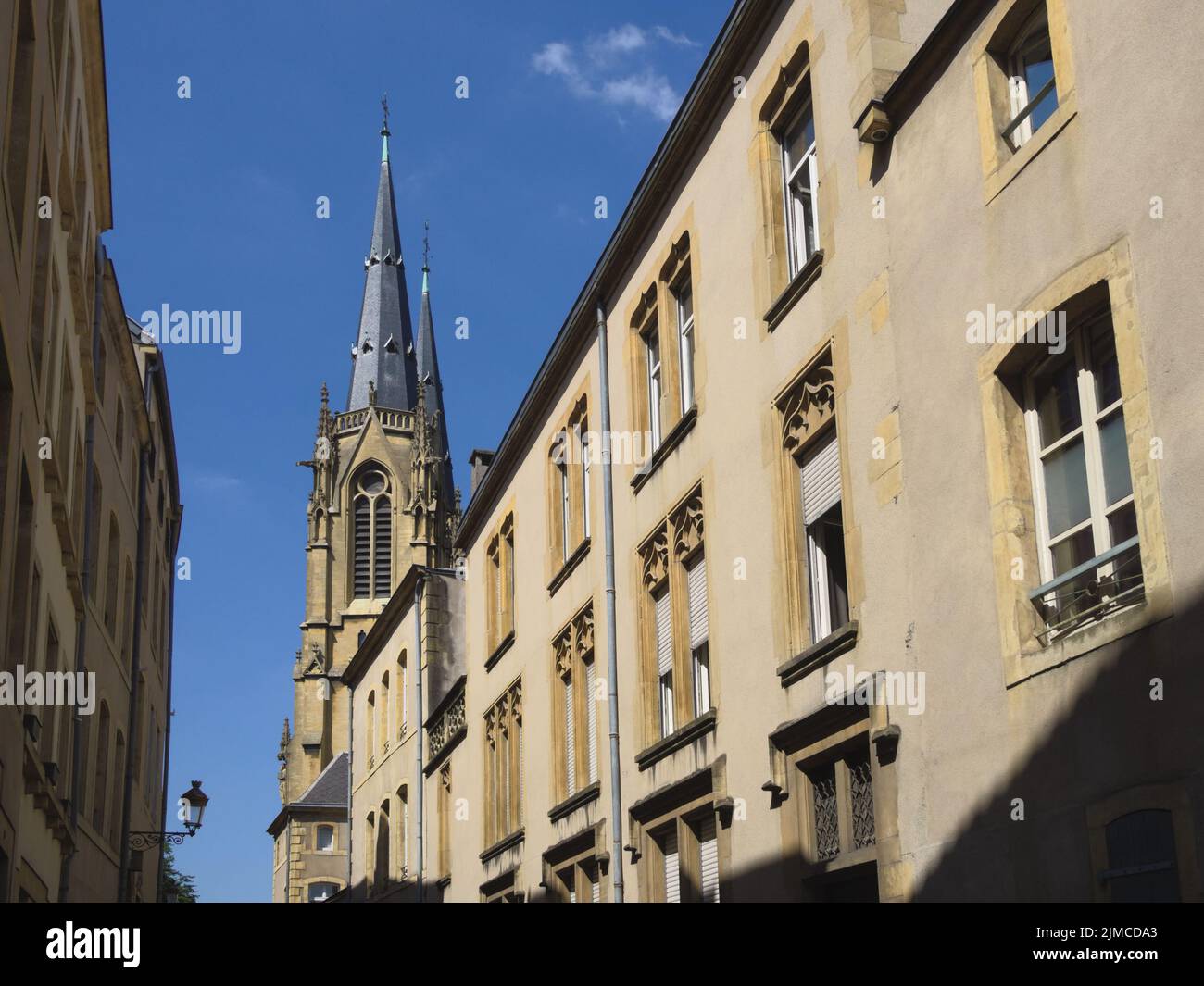 Metz - Old town houses and tower of the church Sainte-SÃ©golÃ¨ne, France Stock Photo