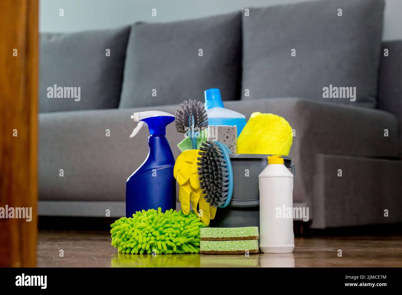 https://c8.alamy.com/comp/2JMCE7M/household-cleaning-products-and-rags-on-floor-chemical-liquids-for-cleaning-maintaining-cleanliness-2JMCE7M.jpg