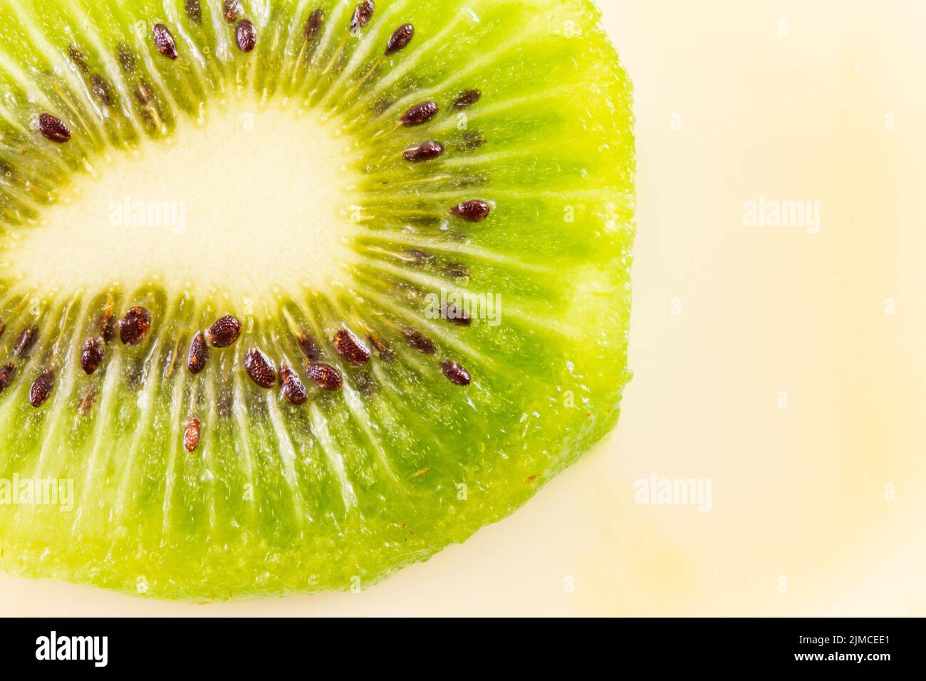 Background of kiwi fruit cut in half Stock Photo