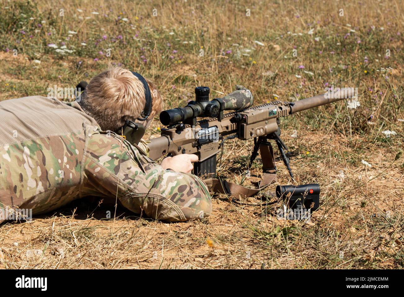 Soldiers fire at targets to zero their rifles during the zeroing phase of the 2022 European Best Sniper Competition in the Hohenfels Training Area, Germany, August 4, 2022. 36 sniper teams from 18 Allied and partner countries will compete head-to-head for the title of Best Sniper Team in Europe across eight days. (U.S. Army photo by Spc Christian Carrillo) Stock Photo