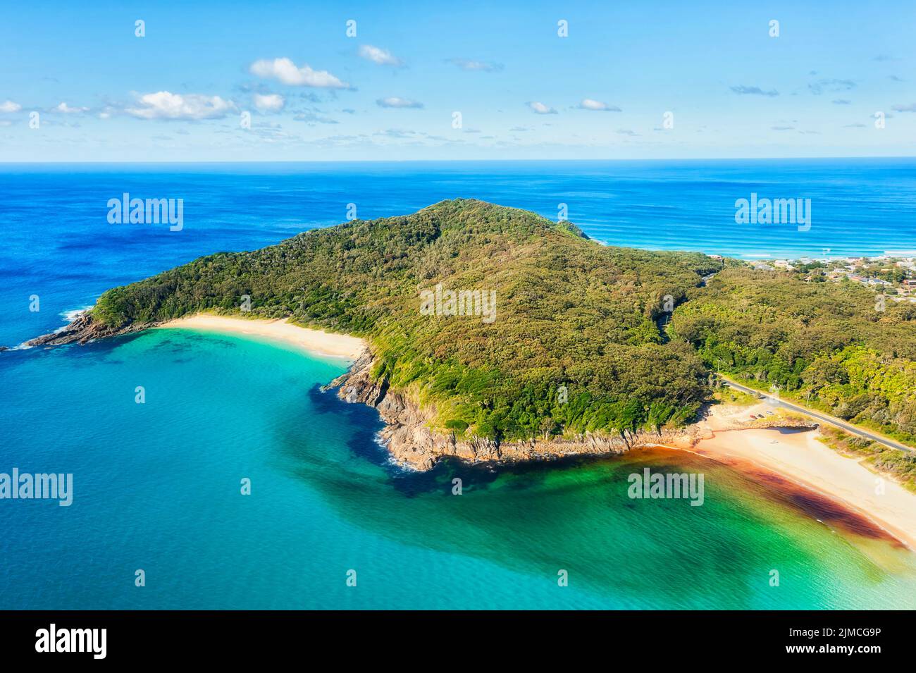 Seagull point headland in Elizabeth beach town of Australia on Pacific coast - scenic aerial tropical seascape. Stock Photo