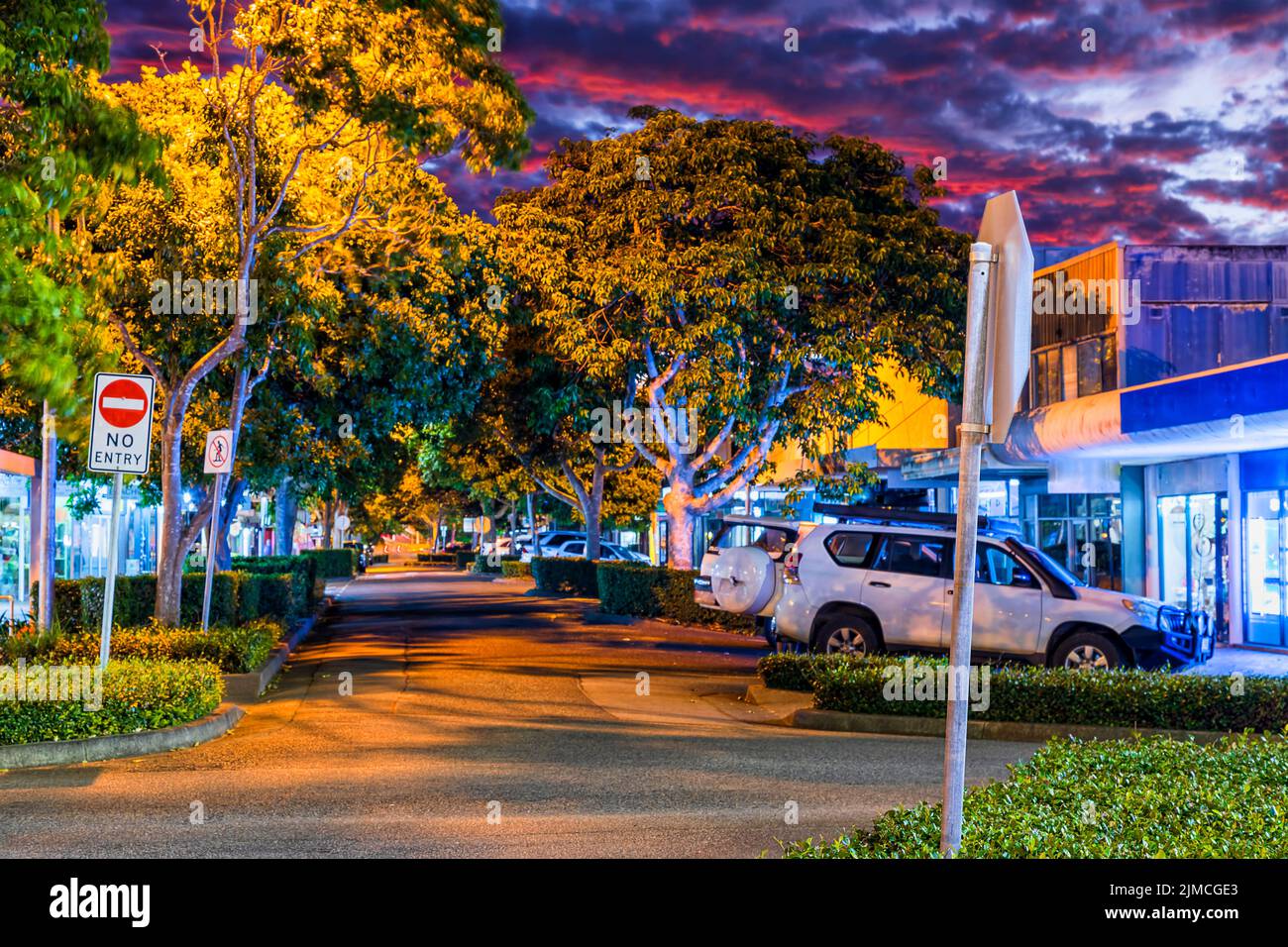 Main shopping retail street in Forster town downtown of Australia at sunset - popular tourist destination on Pacific coast. Stock Photo