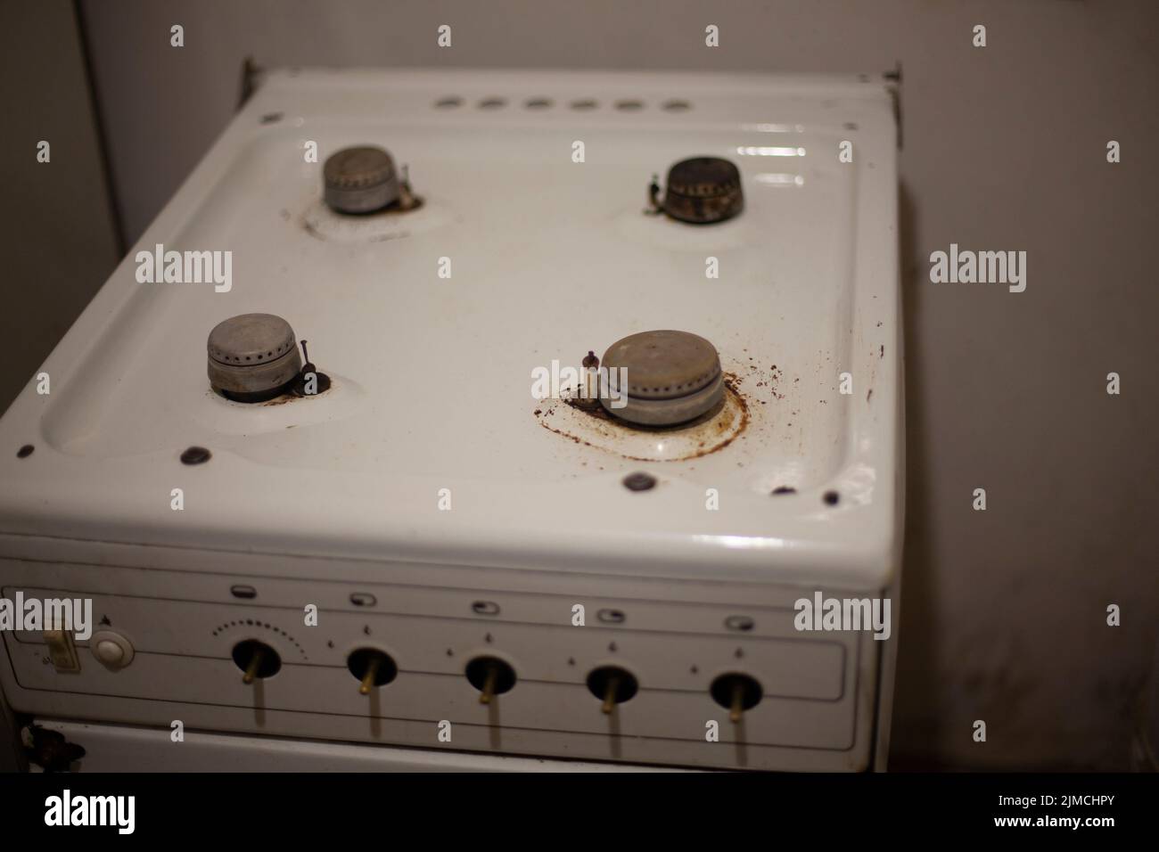 Old gas stove. Burners in kitchen. Equipment in kitchen. Gas oven in