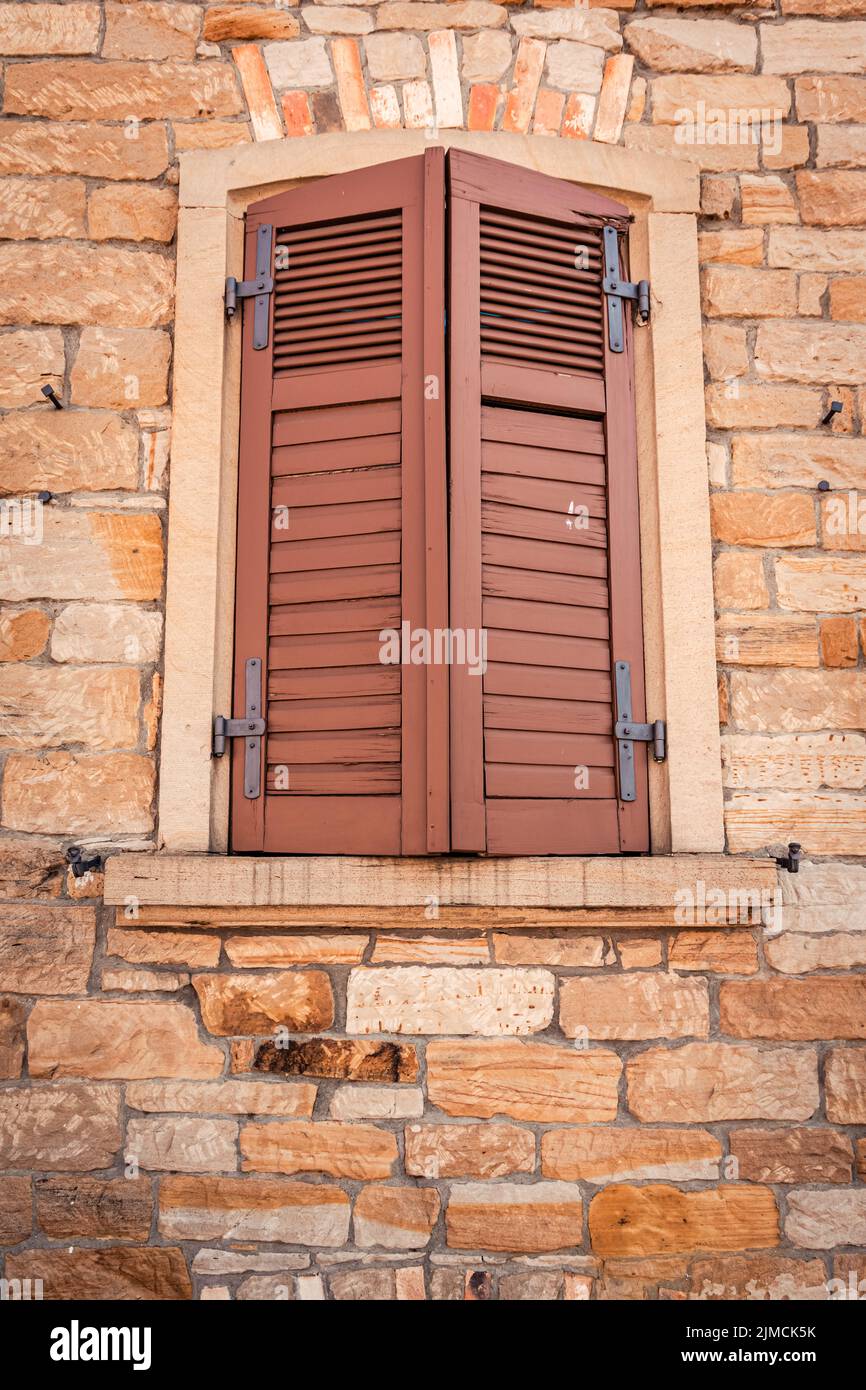 Brown wooden window shutters hi-res stock photography and images - Alamy