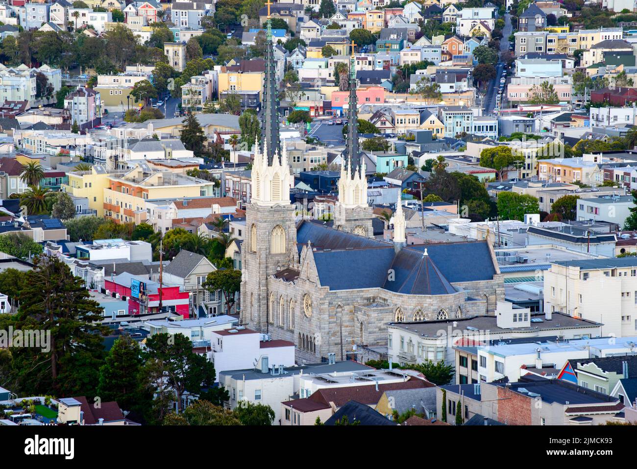 Rolling San Francisco hills with peaked roof homes and streets at