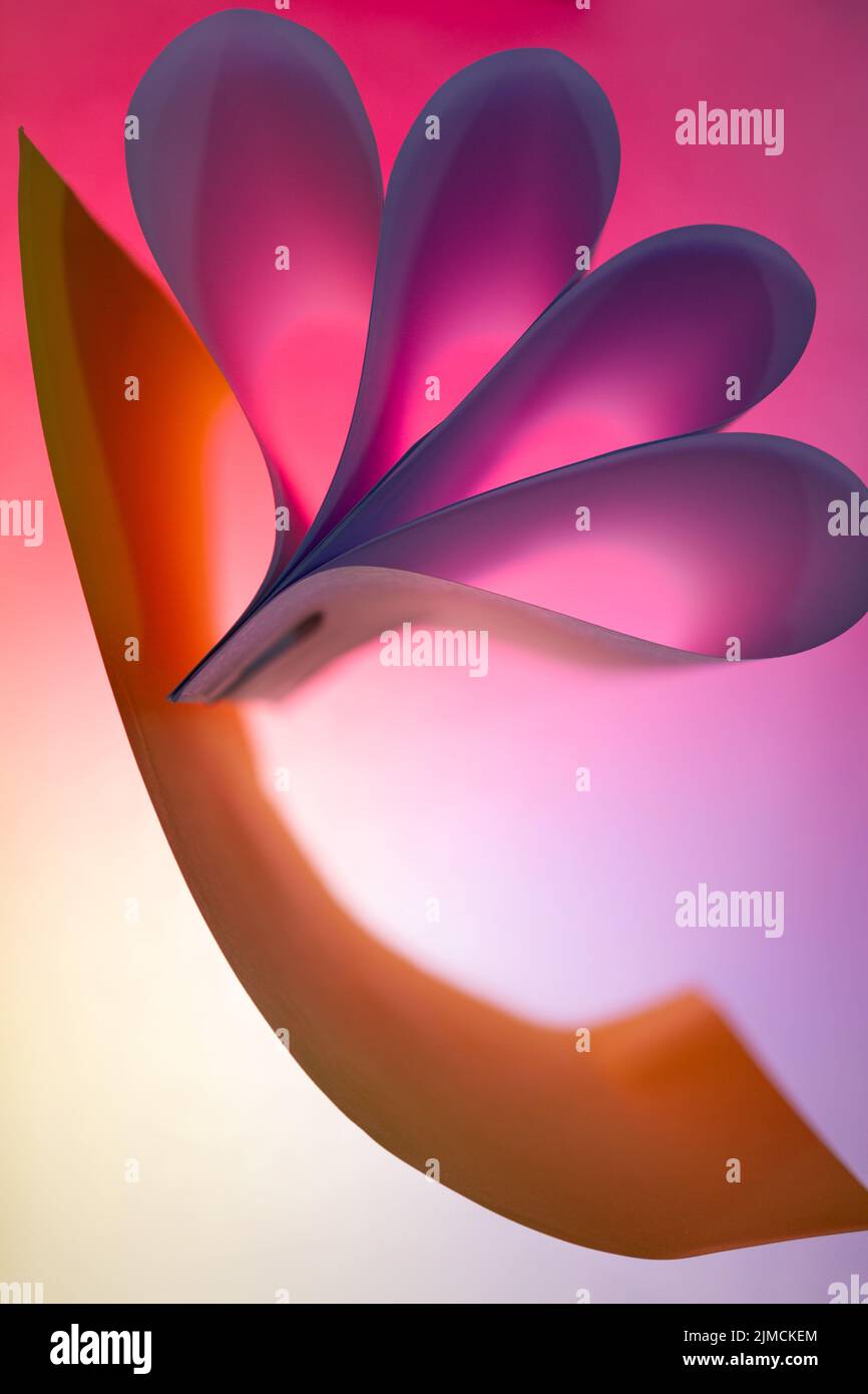 Folded backlit paper abstract shapes suitabe as wallpaper Stock Photo