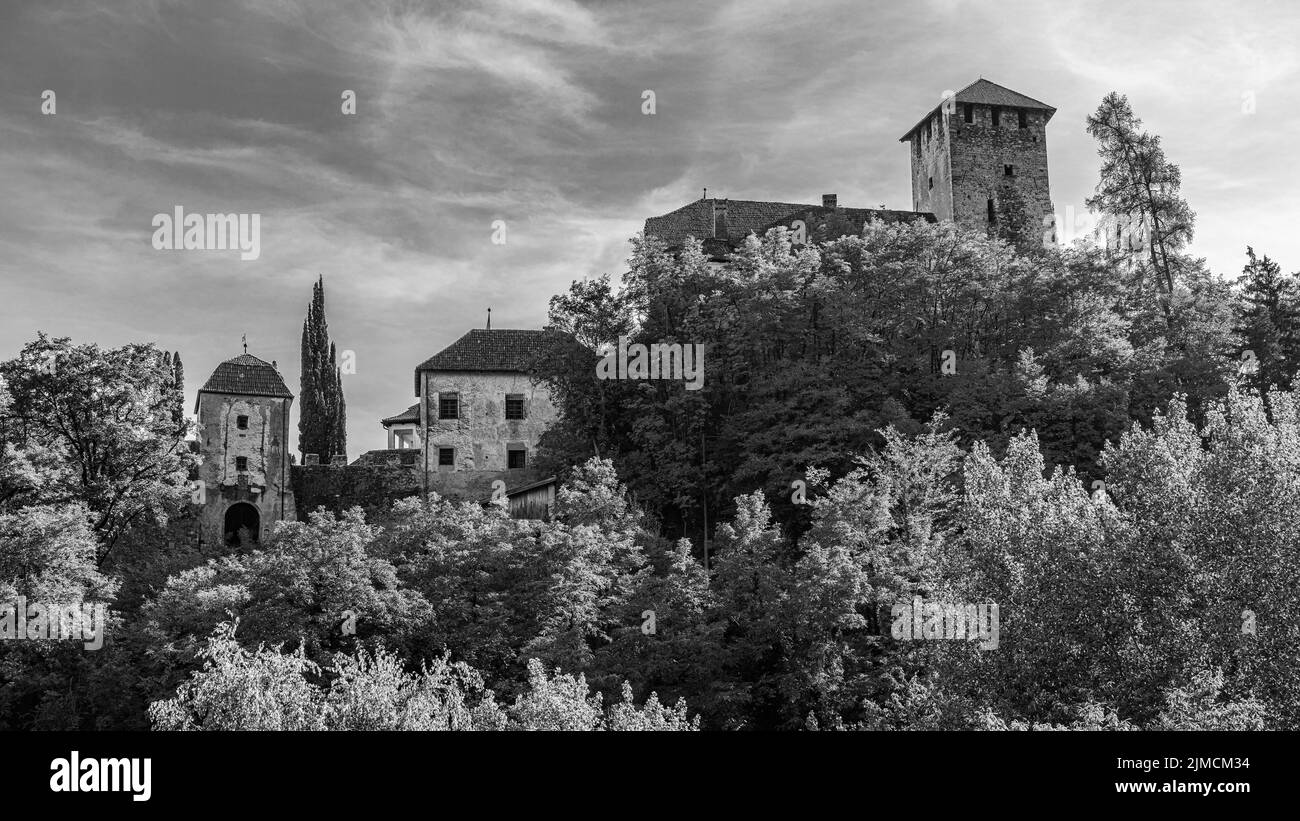 Lebenberg Castle, near Tscherms, black and white photograph, in the background the spa town of Meran, South Tyrol, Italy Stock Photo