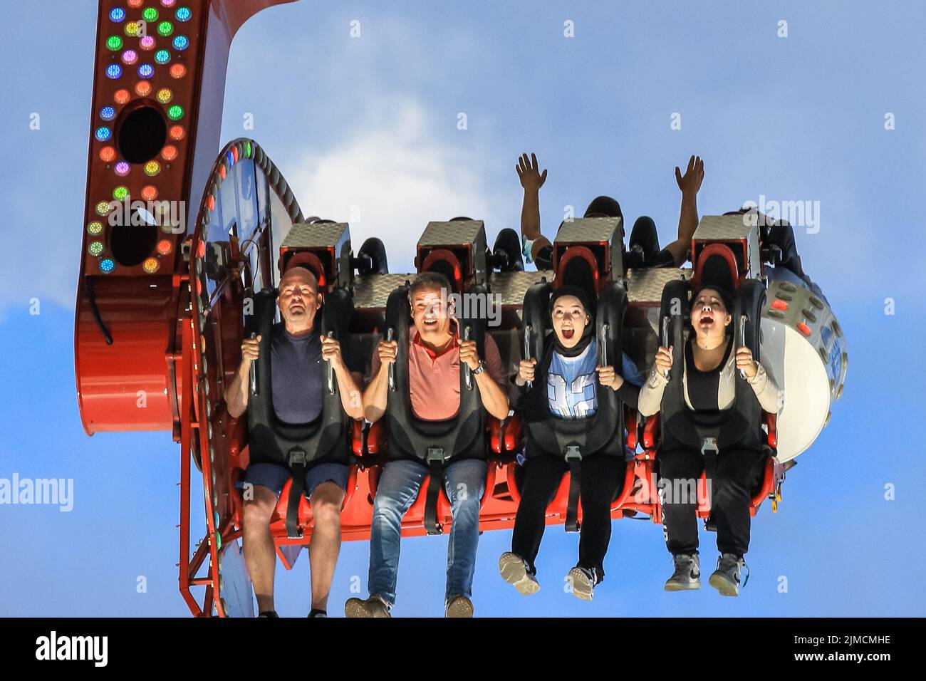 Crange, Herne, NRW, 05th Aug, 2022. People hang suspended in the air on the 55 metre high 'Apollo 13' ride. The official opening day of the 2022 Cranger Kirmes, Germany's 3rd largest funfair and the largest of its kind in NRW, sees thousands of visitors enjoying the carousels, roller coasters, beer halls, food stalls and other attractions. The popular fair, which was paused during the pandemic, regularly attracts more than 4m visitors during its 10 day run and has been established for decades in its current form, with the fair itself dating back to the early 18th century at Crange. Credit: Ima Stock Photo