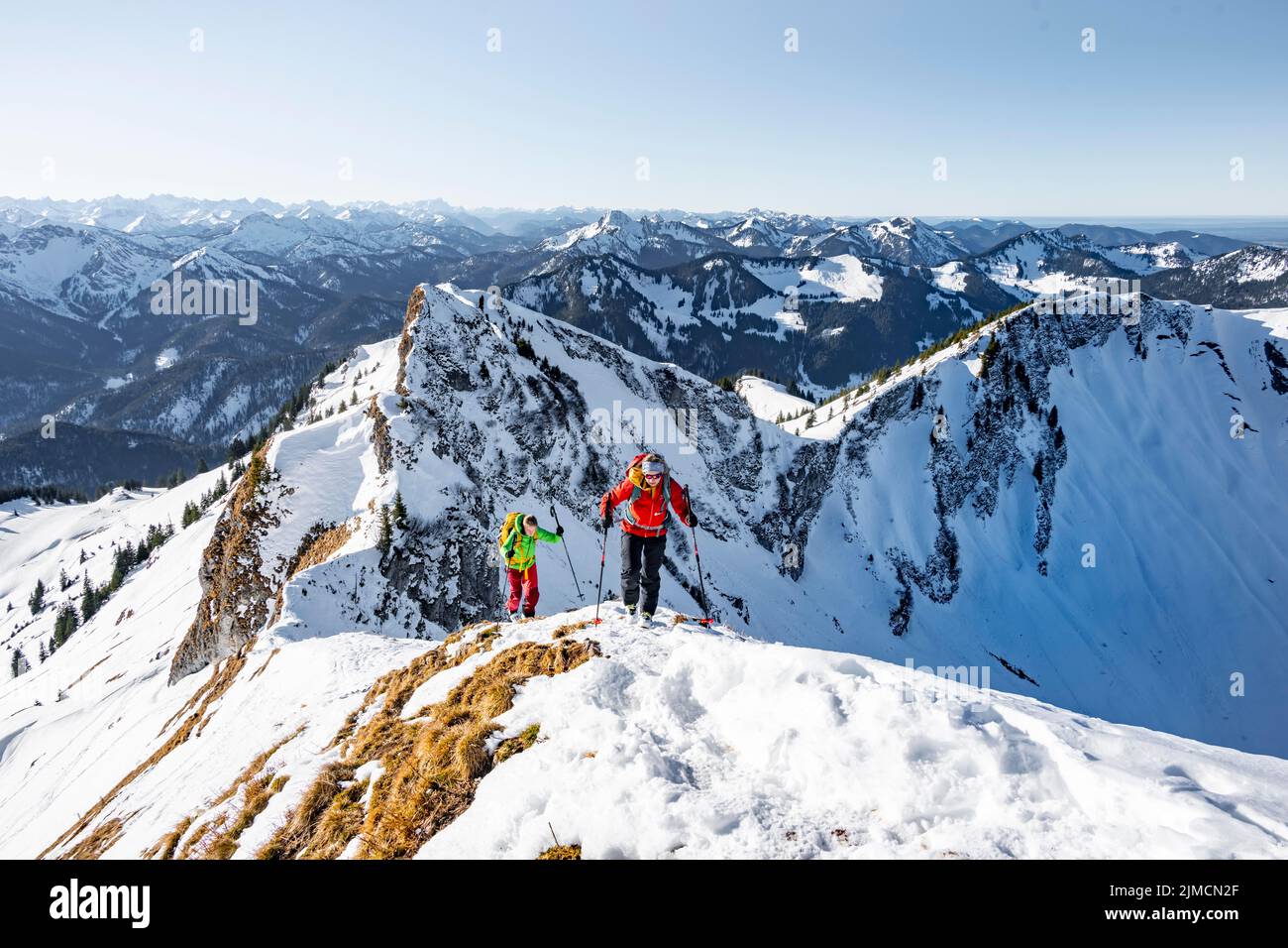 Ski tourers in winter on the snow-covered Rotwand, mountains in winter, Schlierseer Berge, Mangfall mountains, Bavaria, Germany Stock Photo