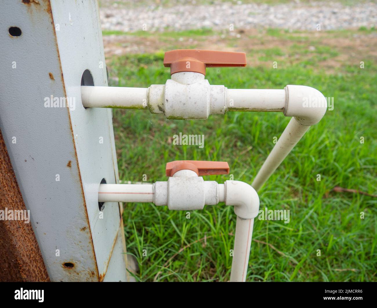 Valve in the gas column. Outdoor gas meter. Communications. Pipes on