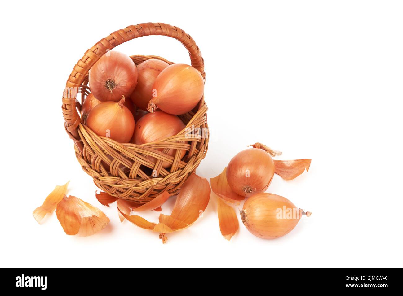 Ripe fresh golden onions on a white background Stock Photo
