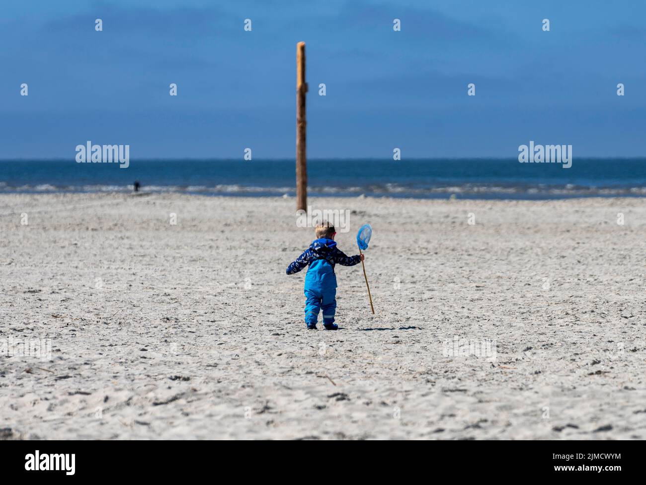 Toddler on the beach of the Baltic Sea, Sankt Peter Ording, Schleswig Holstein, Germany Stock Photo