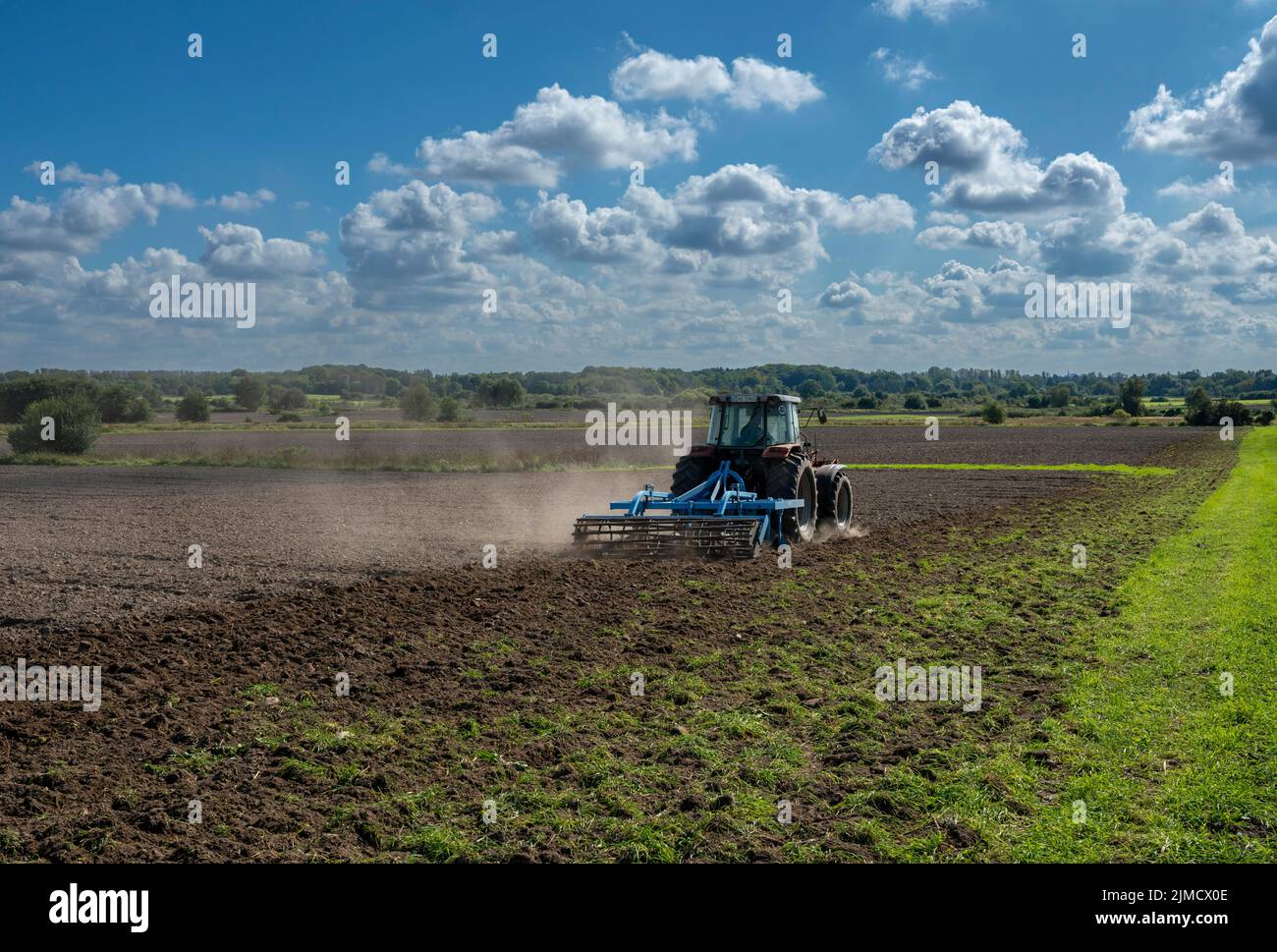 Agriculture, tractor ploughing the field, Berlin, Germany Stock Photo