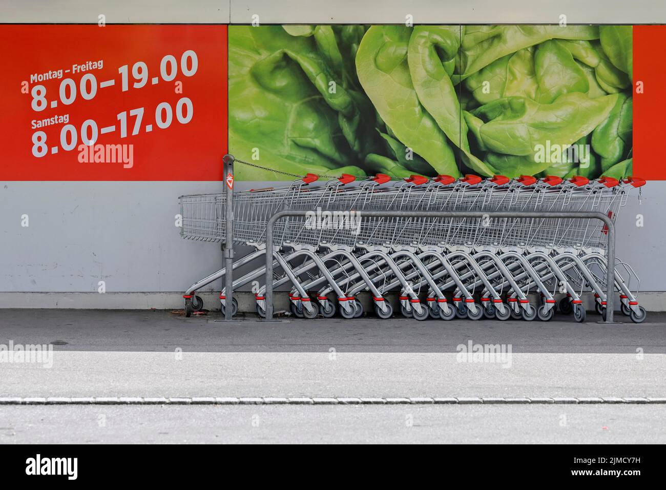 Shopping cart opening hours Stock Photo Alamy