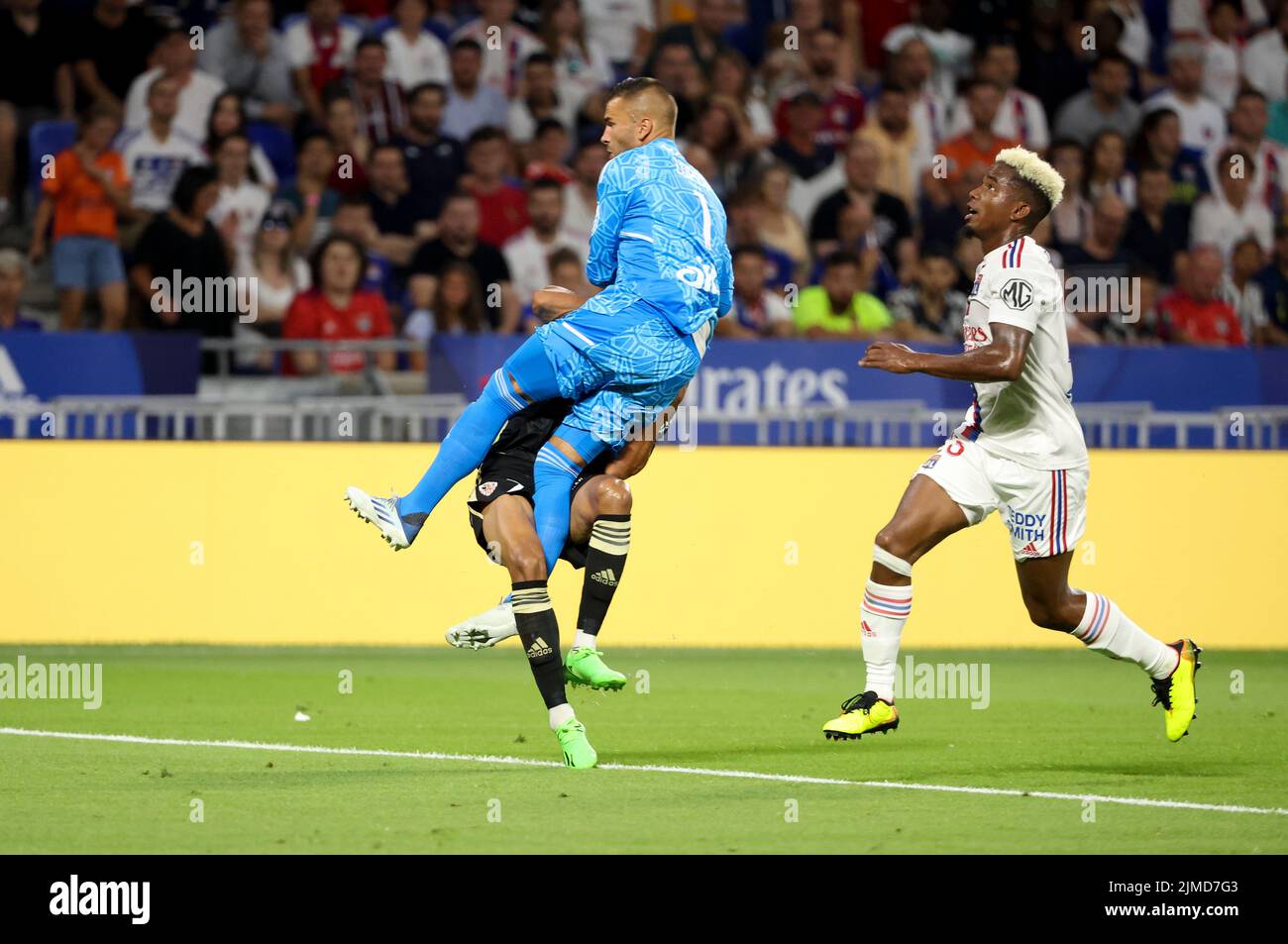 Goalkeeper of Lyon Anthony Lopes hits Mounaim El Idrissy of Ajaccio and  will receive a direct red card for it, right Thiago Mendes of Lyon during  the French championship Ligue 1 football