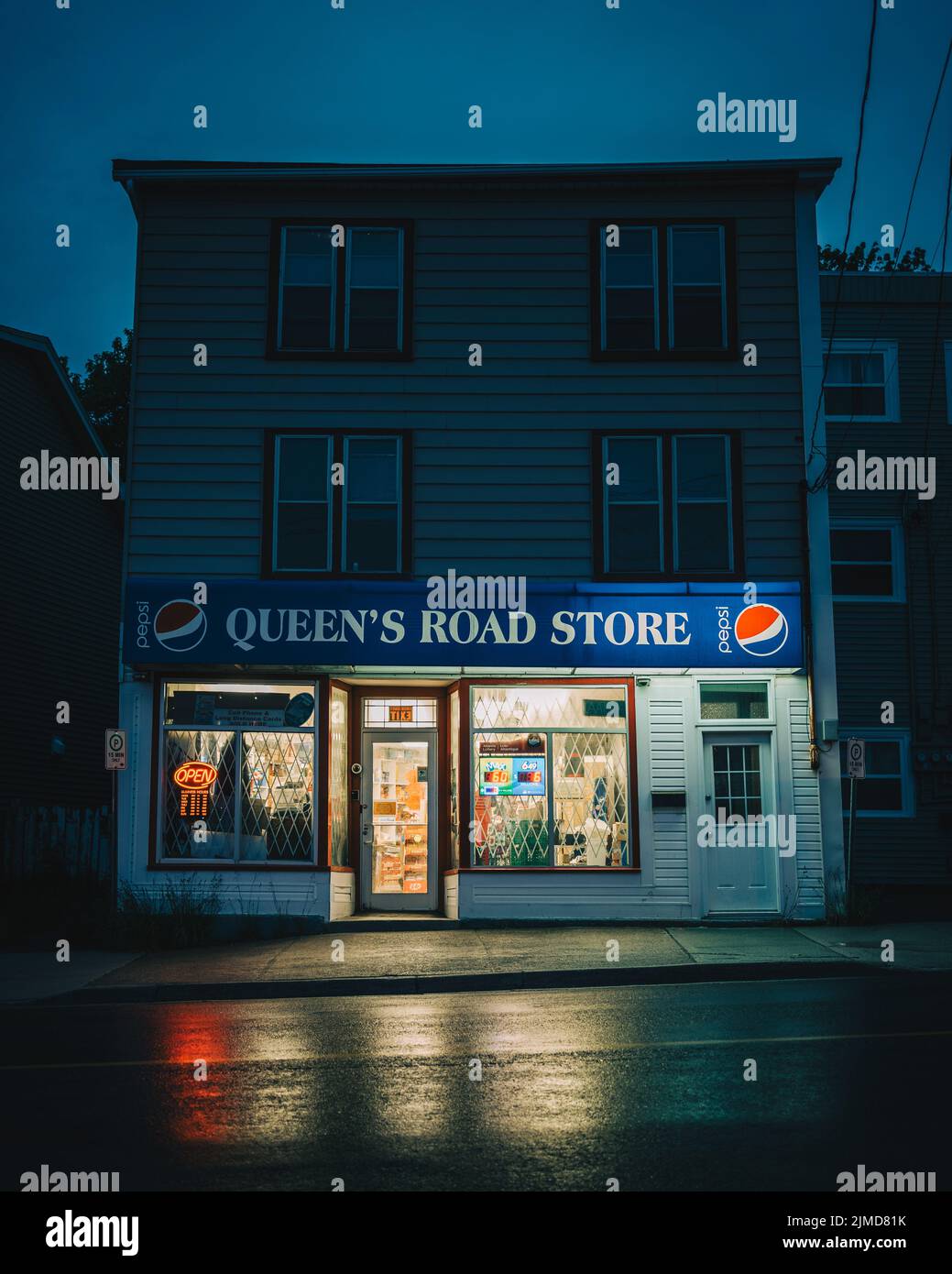 Queens Road Store vintage sign at night, St. Johns, Newfoundland and Labrador, Canada Stock Photo