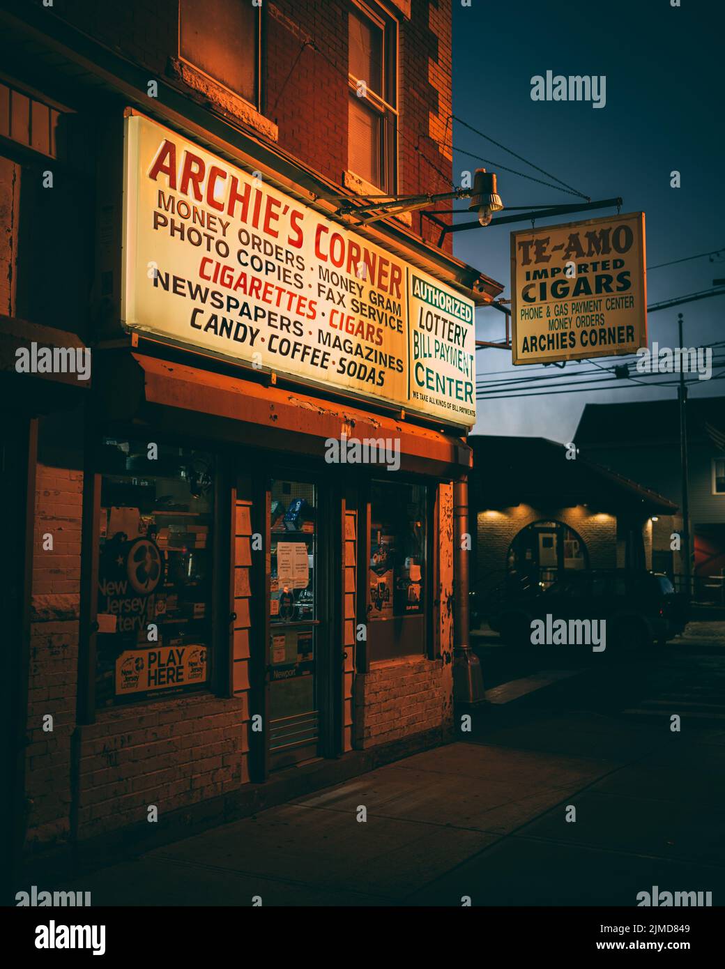 Archies Corner vintage signs at night, Elizabeth, New Jersey Stock