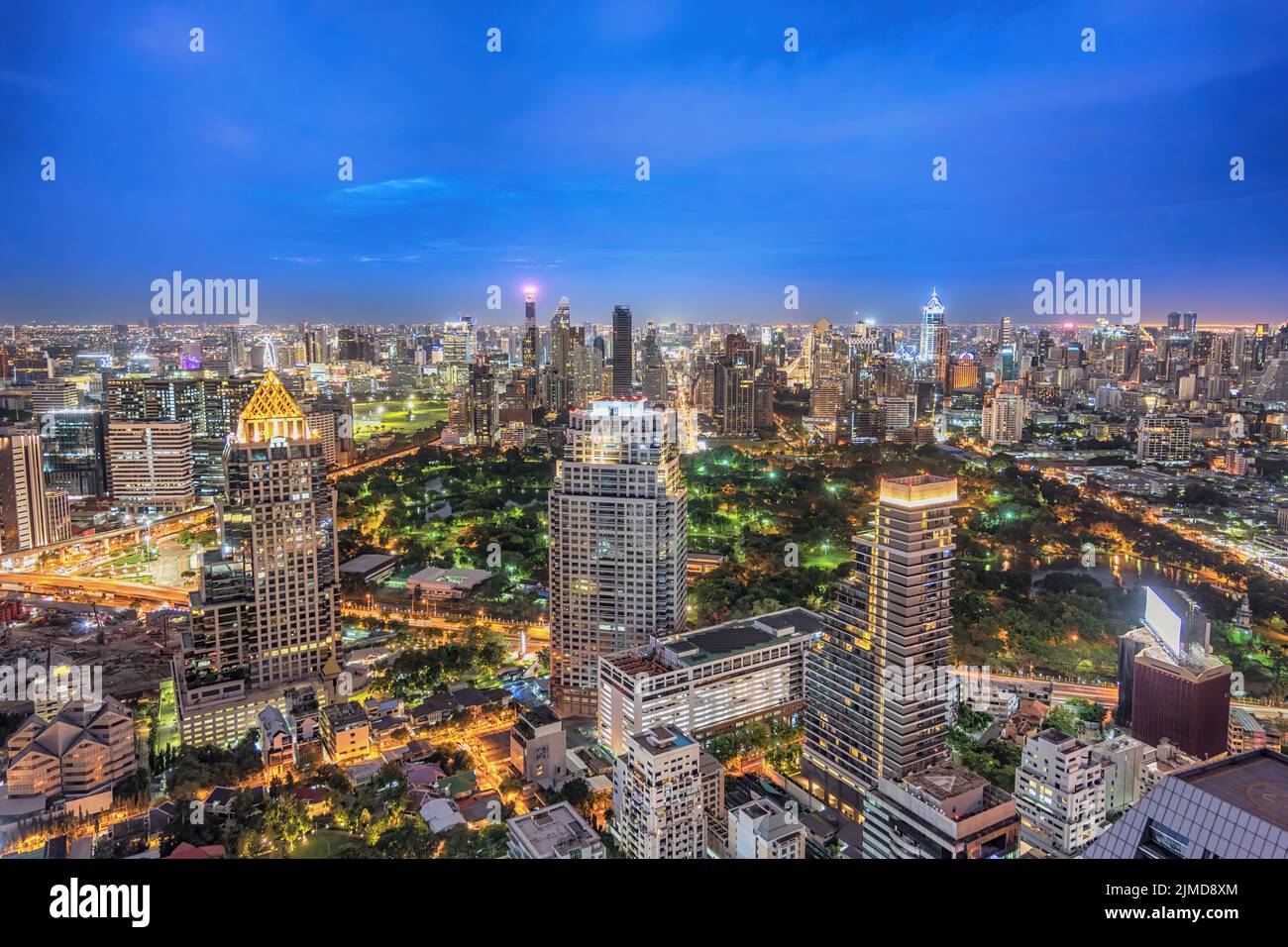 Bangkok Thailand, night city skyline of skyscraper at Bangkok downtown and Lumpini Park Stock Photo