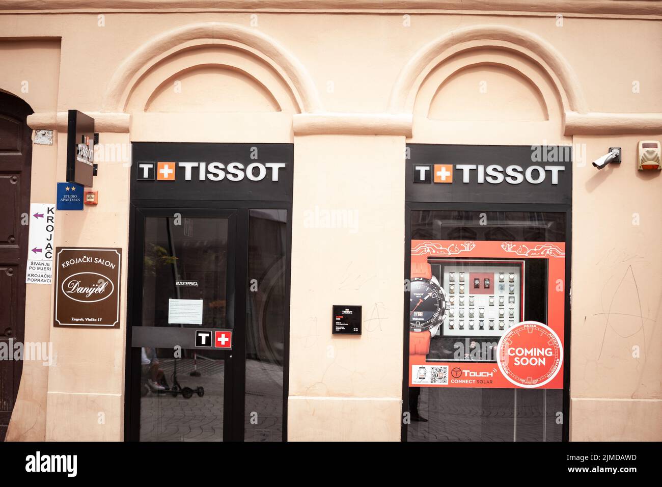 Picture of a sign with the logo of Tissot on their main store in Ljubljana, Slovenia. Tissot SA Is a Swiss luxury watchmaker. The company was founded Stock Photo