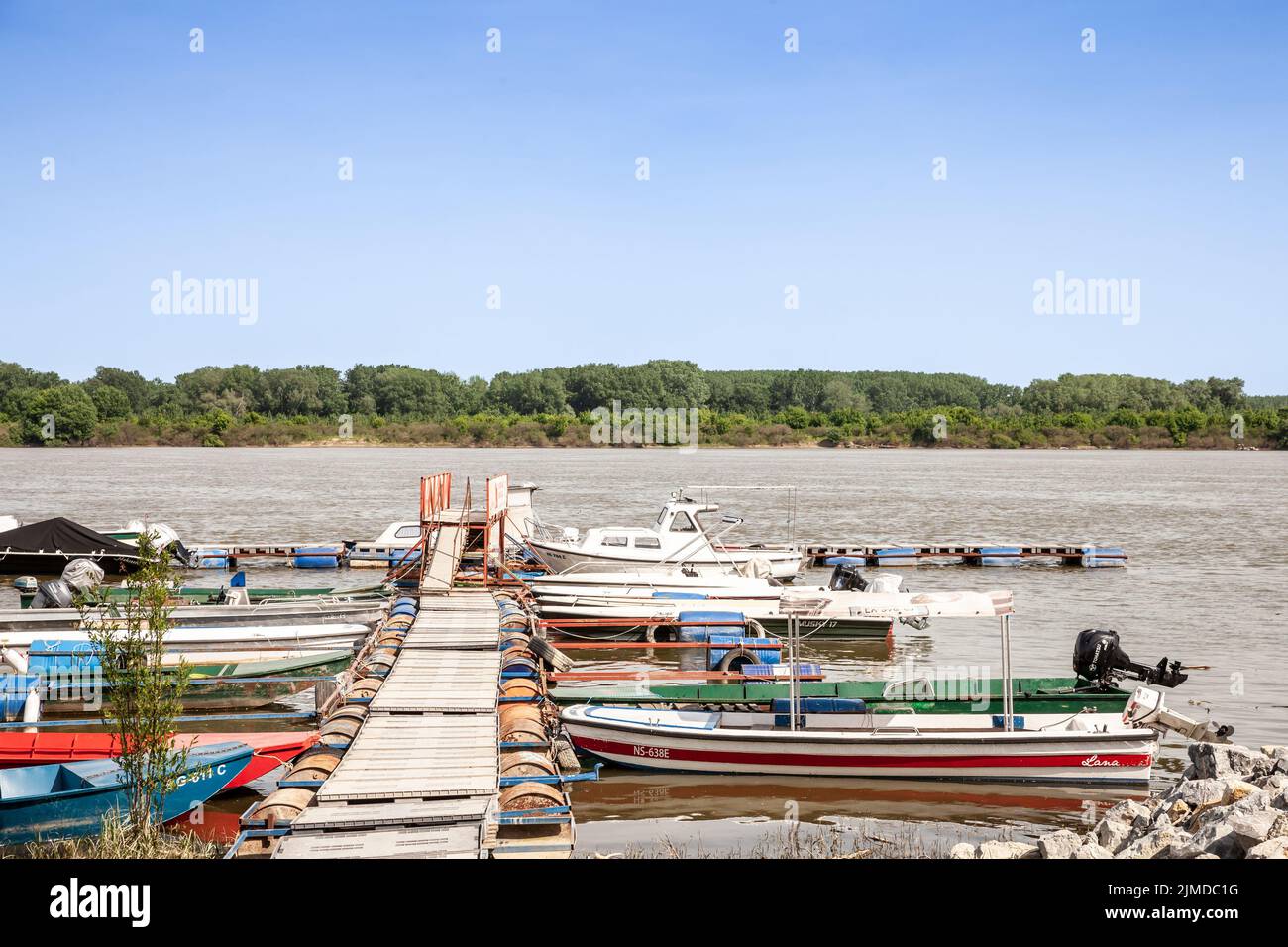 Picture of boats of various sizes on Danube river in the afternoon in Novi Banovci Serbia, during spring Stock Photo