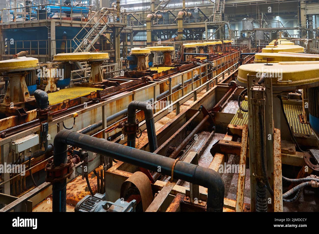 Floatation machines operate with mineral ore at factory Stock Photo