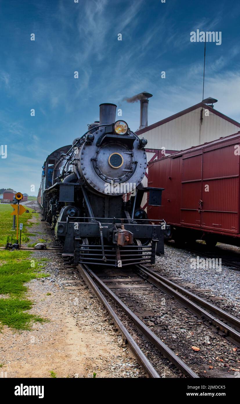 Steam Engine Locomotive with Passenger cars Stock Photo