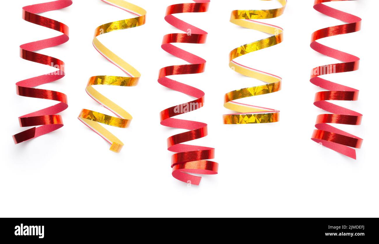 Red And Gold Serpentines Isolated Over White Stock Photo