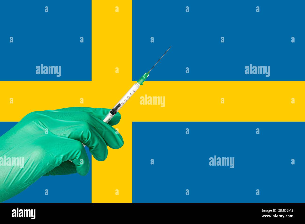 Corona vaccination in front of a Sweden flag Stock Photo