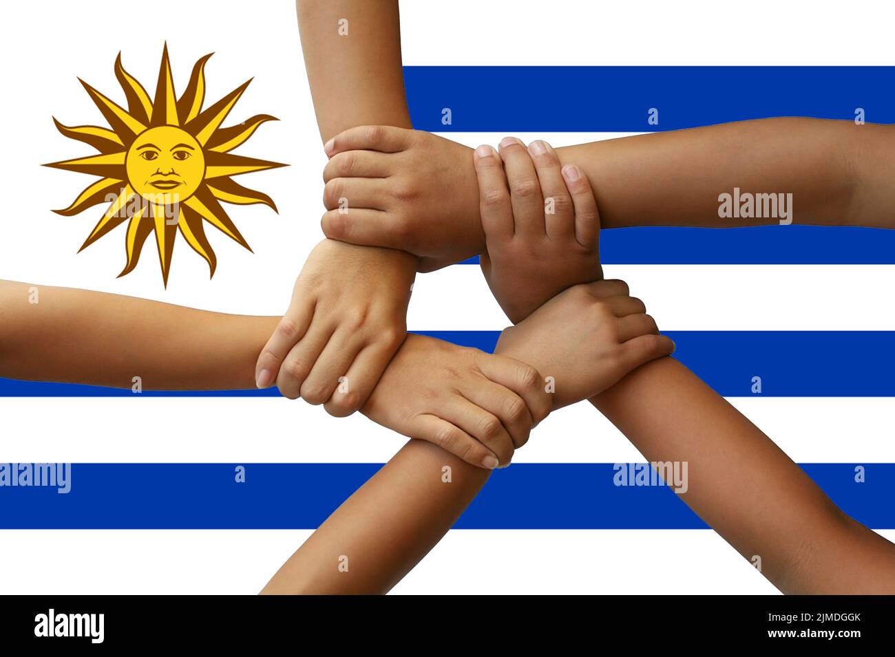 Uruguay flag, intergration of a multicultural group of young people Stock Photo