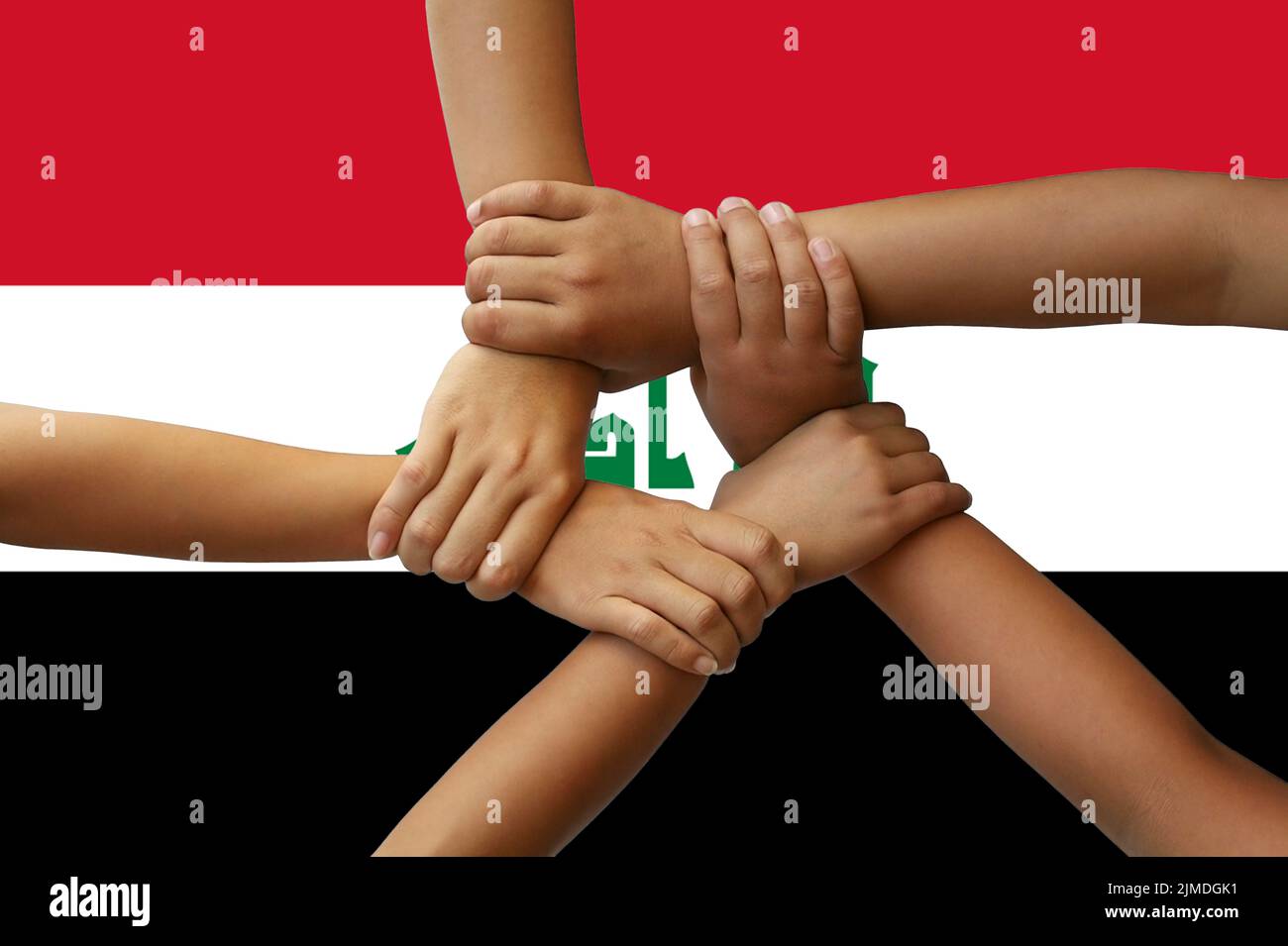 Flag of Iraq, intergration of a multicultural group of young people Stock Photo