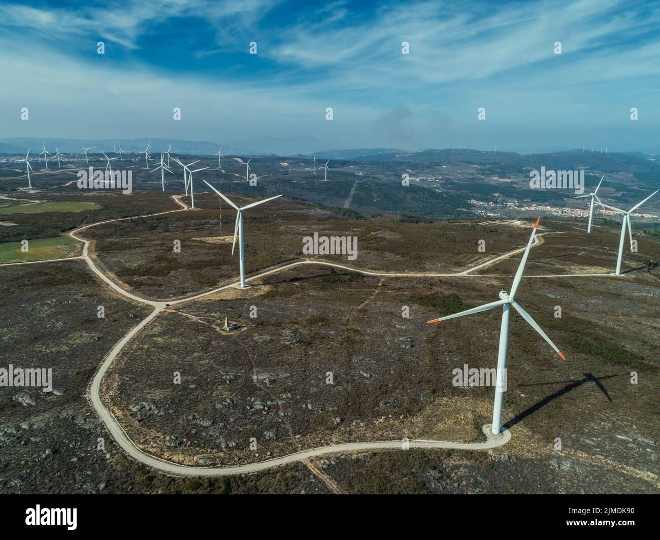 Windmills or wind turbine on wind farm Stock Photo
