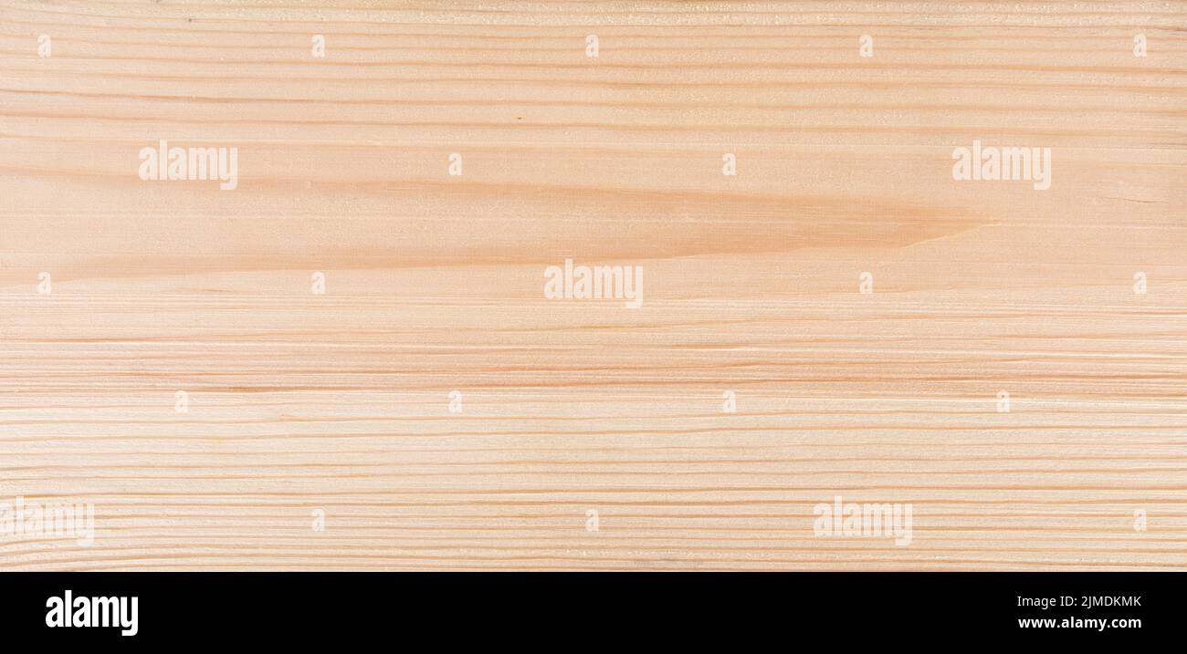 Background planed pine boards. Light bright wood texture. Stock Photo