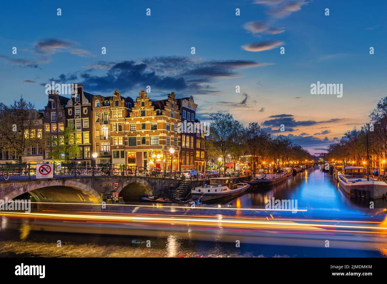 Amsterdam Netherlands, night city skyline of Dutch house at canal ...