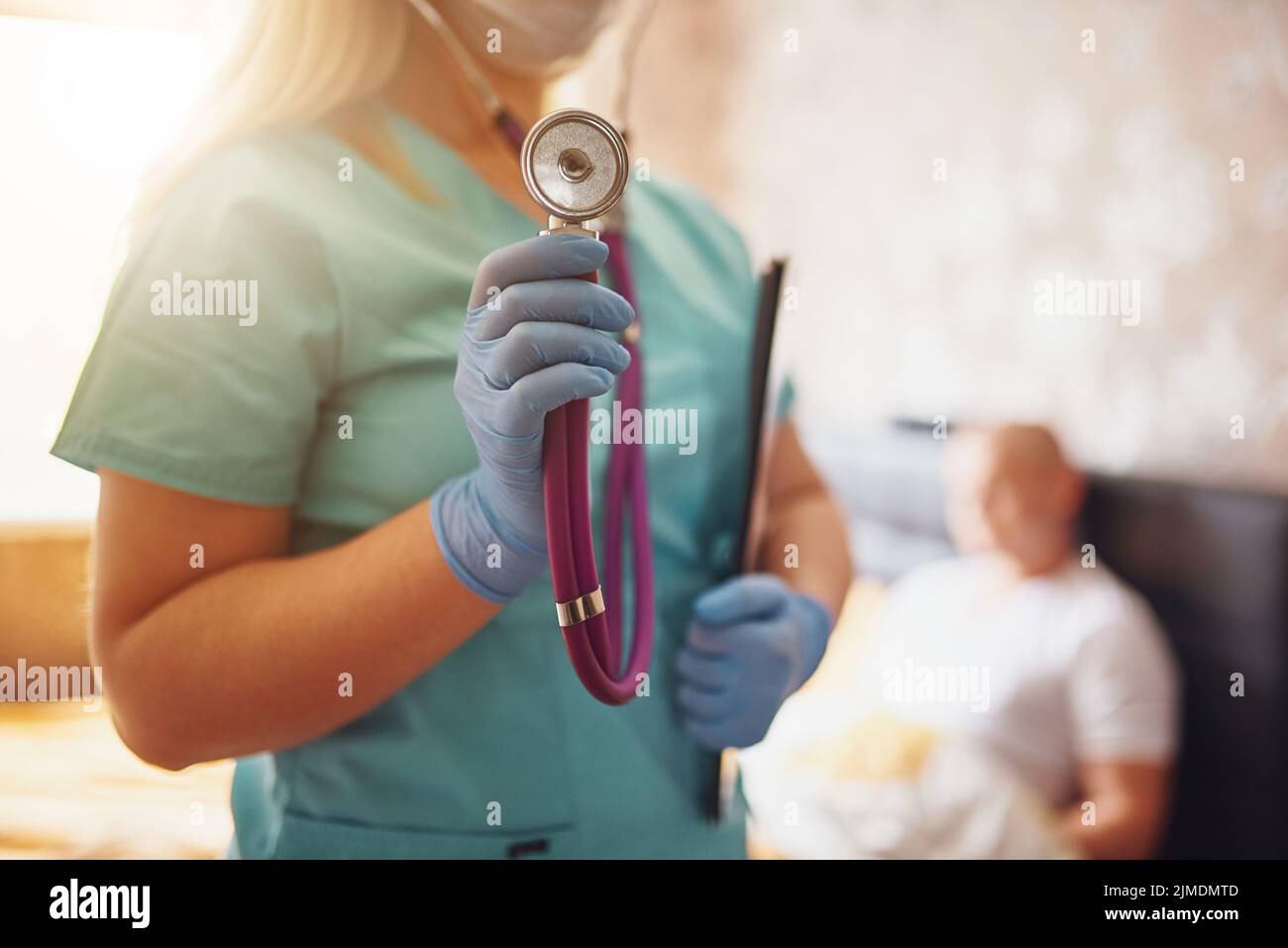 House call. Doctor visit at home. Examination of the patient. Portrait