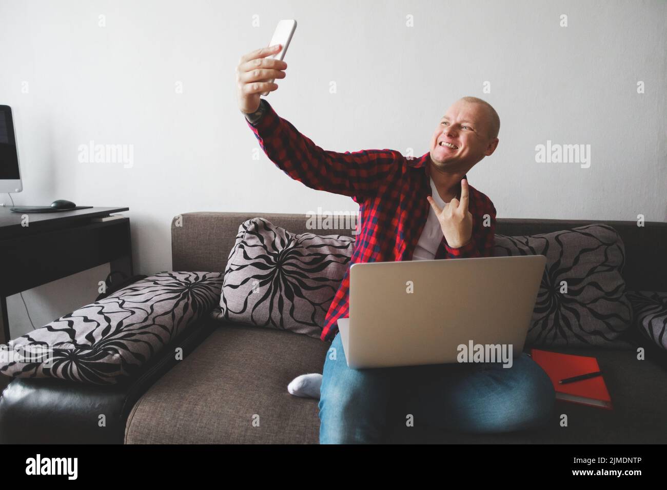 Man teleworking from home after coronavirus pandemic Stock Photo