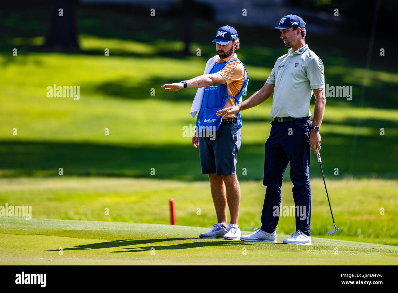 August 5, 2022 Michael Gligic sizes up a birdie putt on the seventh