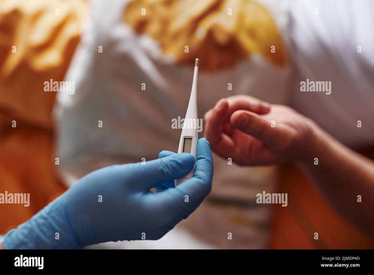 The young guy caught a cold. House call. Examination by a doctor