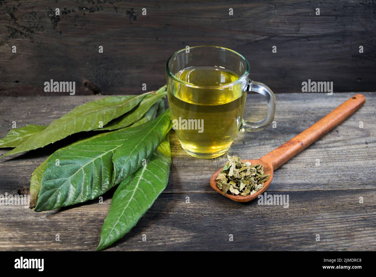Medicinal infusion of loquat leaves with honey Stock Photo