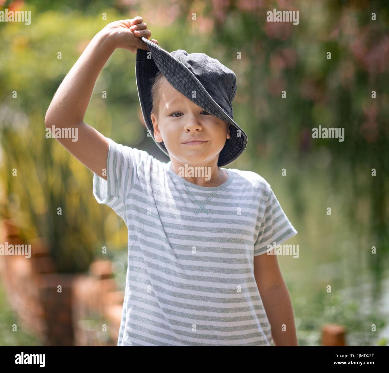 Outdoor portrait of a cute boy Stock Photo - Alamy