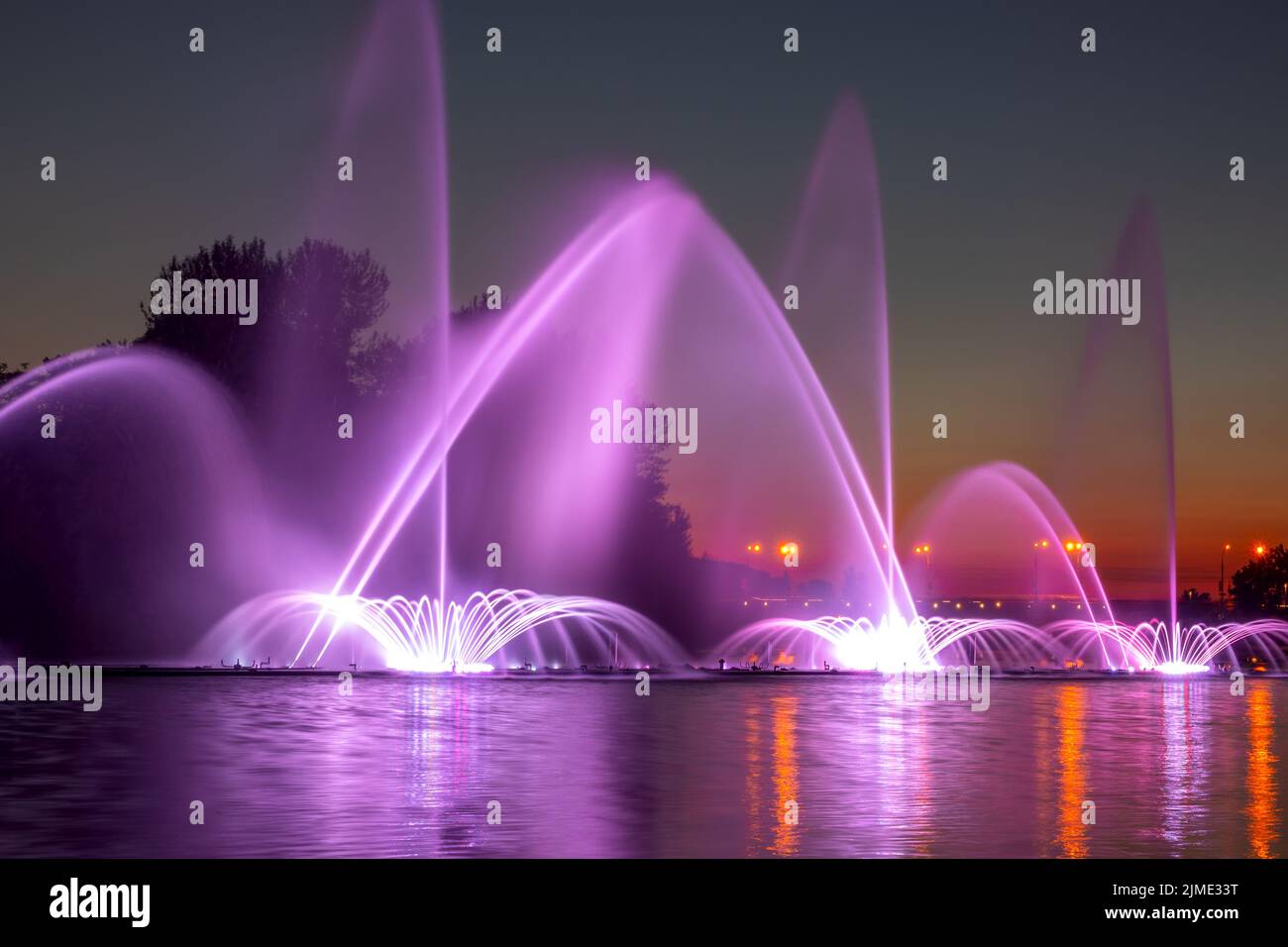 Dark Summer Night and Colored Fountain Stock Photo - Alamy