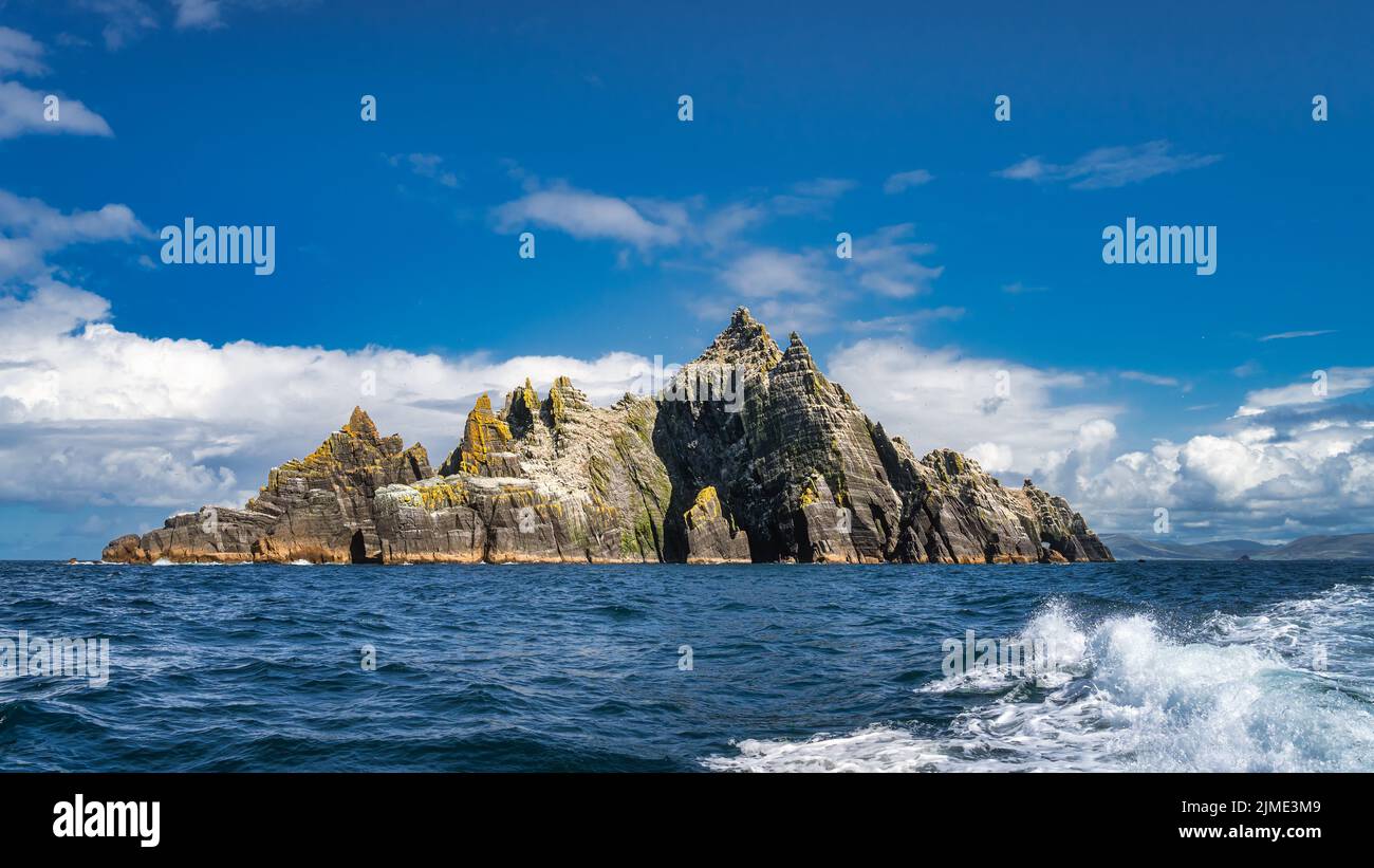 Panorama with Little Skellig island with heaped mountains, habitat of Gannets Stock Photo