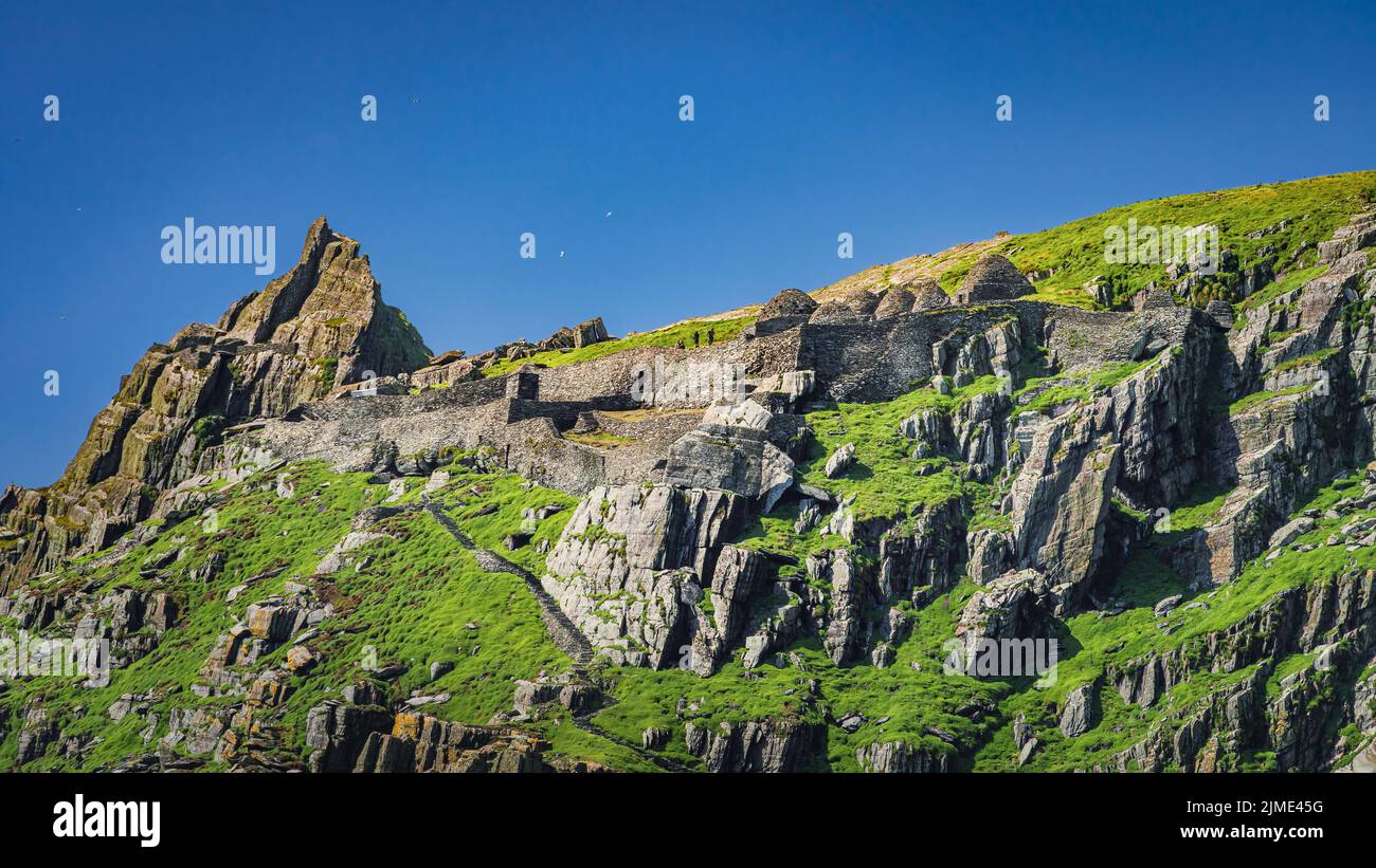 Tourists visiting Skellig Michael island and monks hermitage, where Star Wars were filmed Stock